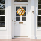 Rustic fall wreath with golden eucalyptus, white pumpkins, and wheat for front door decor, 20-22 inches, CozyNest Decor.