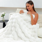 CozyNest Decor ivory faux fur throw blanket with double-sided plush, thick and fluffy, perfect for couch, sofa, or bed.