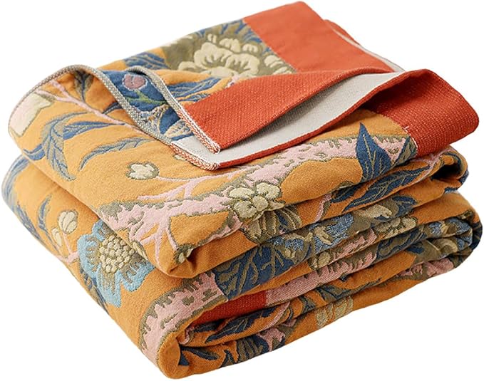 CozyNest Decor boho muslin bed blanket with floral orange design, 4-layer gauze cotton, 80x90 inches, soft and cooling for summer.