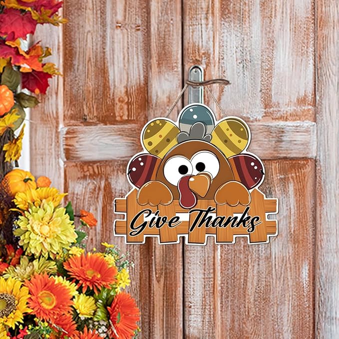 CozyNest Decor Give Thanks sign featuring a turkey design, wooden Thanksgiving door hanger for fall porch or outdoor decor.