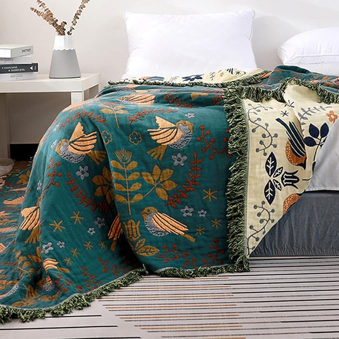 CozyNest Decor fall throw blanket with bird and flower patterns, versatile organic cotton blanket for beds, couches, and vintage décor.