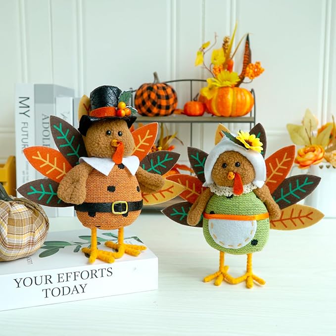 Two plush Thanksgiving turkey figurines with dangling legs, cozyNest Decor autumn harvest tabletop decor for fall and Halloween.