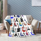 CozyNest Decor electric guitar pattern fleece throw blanket, soft music-themed blanket for kids and adults, 60x50 inches.