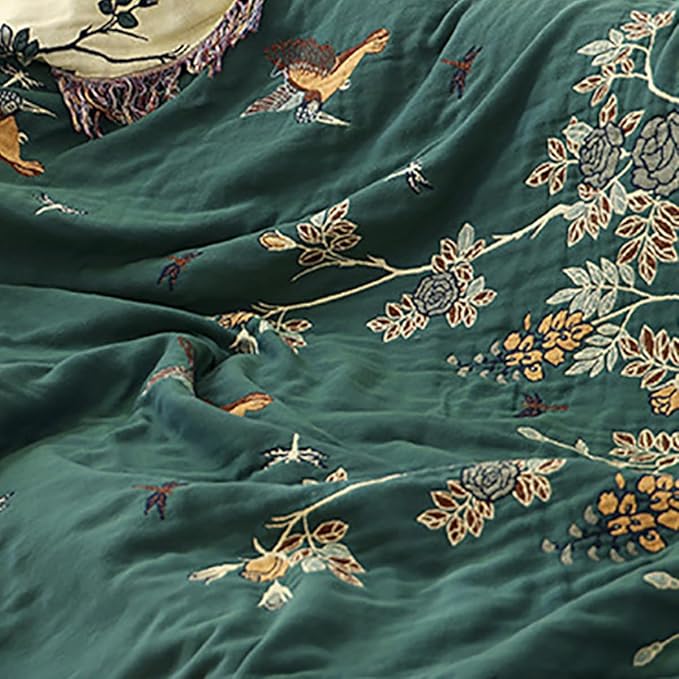 Boho muslin blanket for adults by CozyNest Decor, twin size 80x90 inches, soft cotton, floral design with tassels for sofa or bed.