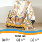 CozyNest Decor boho large cotton throw blanket with floral and butterfly patterns, 60x80 inches, lightweight soft home decor quilt.