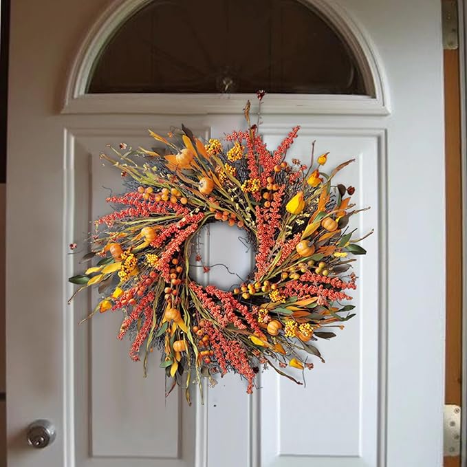 Fall wreath for front door featuring pumpkins, berries, eucalyptus leaves, lantern, and harvest accents, perfect for autumn or Thanksgiving.