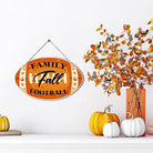 Rustic autumn wooden sign with football design, perfect for Thanksgiving and fall home decor by CozyNest Decor.