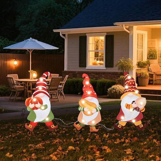 CozyNest Decor Wonder Garden 3-piece fall gnome yard signs with LED lights, pumpkins, and autumn harvest decorations for outdoor lawn and porch.