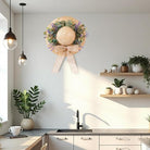 CozyNest Decor 16-inch spring eucalyptus wreath with bow, ideal for front door, wall, or window decor for summer and fall.