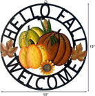 Rustic metal hanging pumpkin wreath with "Hello Fall" sign, autumn leaves, and rustic accents for farmhouse front door decor.