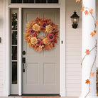 Large 28-inch fall wreath with artificial maple leaves, sunflowers, hydrangeas, and pumpkins for front door or porch decor.