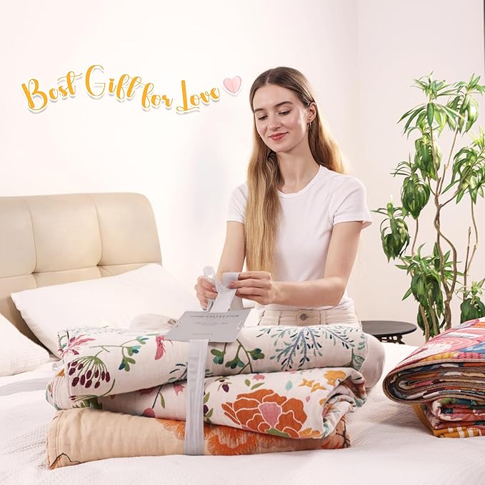 CozyNest Decor boho large throw blanket with fall floral and bird design, made of breathable organic cotton for sofa or bed.