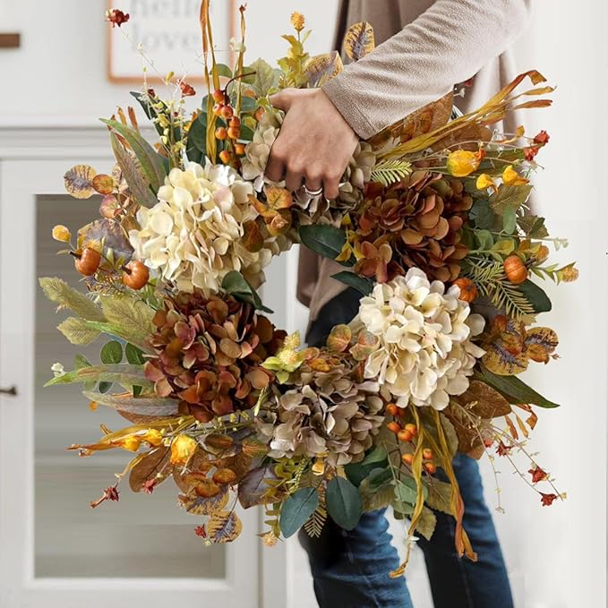 CozyNest Decor 24-inch fall wreath with hydrangeas and small pumpkins, ideal for front door autumn, Halloween, or Thanksgiving decor.