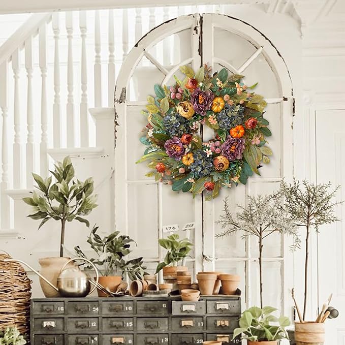 CozyNest Decor 24-inch fall wreath with blue hydrangeas, purple peony, orange pumpkins, perfect for front door autumn decor.