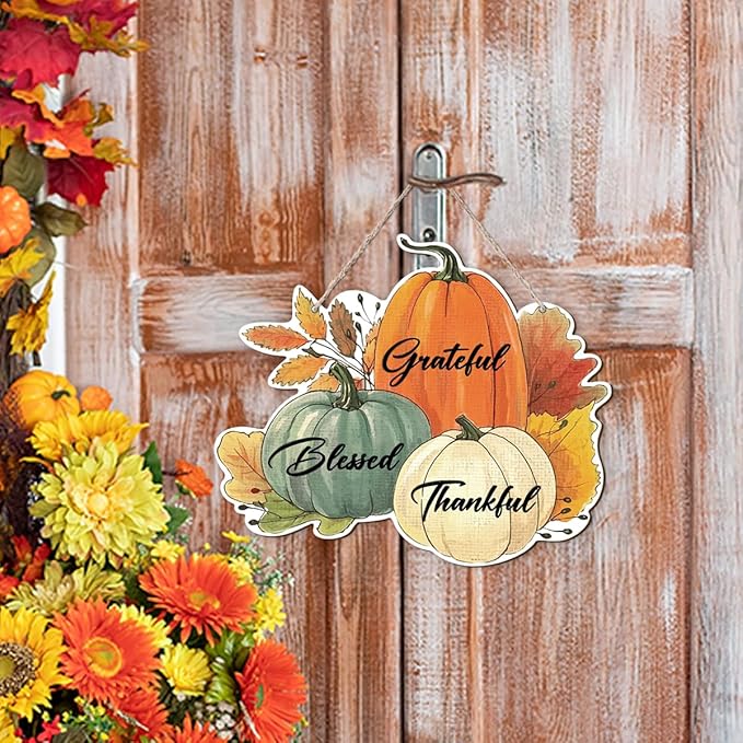 CozyNest Decor fall-themed wooden door hanger with maple leaves and mushroom design, perfect for autumn harvest and Thanksgiving decor.