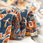 CozyNest Decor boho muslin bed blanket with circle geometric pattern, 80x90 inches, soft 4-layer gauze cotton summer coverlet.