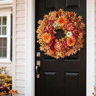 Large 26-inch artificial fall wreath with maple leaves, faux pumpkins, and silk peonies for front door or porch decor.