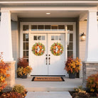 Fall front door wreath by CozyNest Decor featuring pumpkins, peonies, sunflowers, dahlias, and autumn artificial flowers.