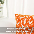 Orange floral embroidered throw pillow cover by CozyNest Decor, 18x18 inch cotton farmhouse cushion for sofa or bed.