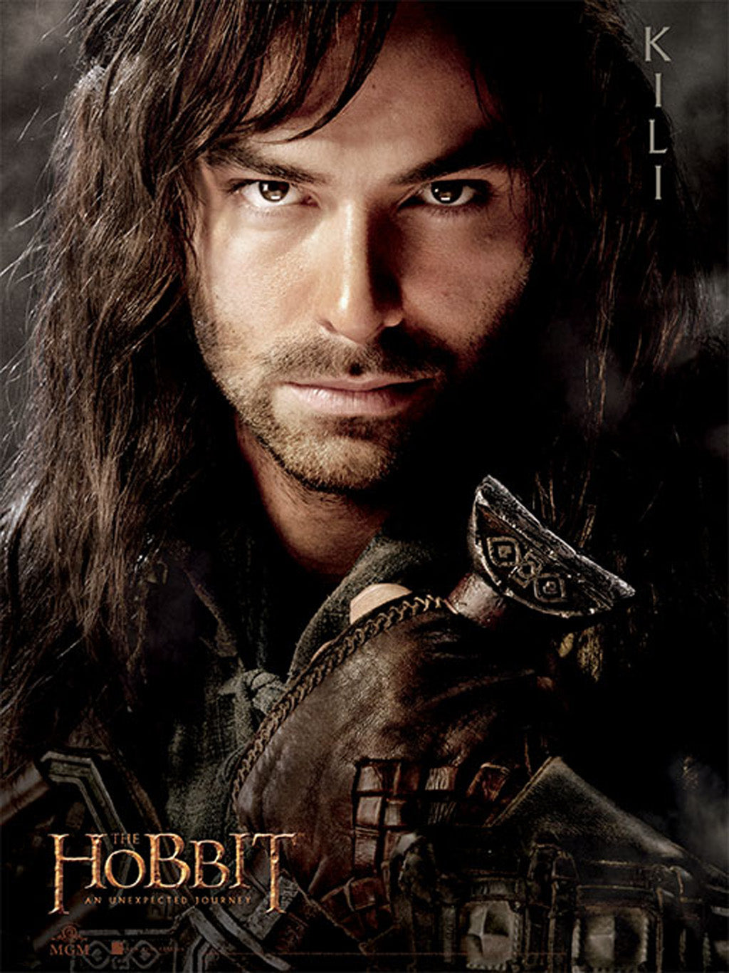 Open softcover copy of The Hobbit book by Insight Editions with detailed interior illustrations visible.