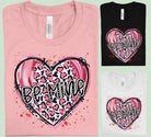Be Mine graphic tee from Anchored Grace Boutique featuring a stylish design on a casual cotton shirt.