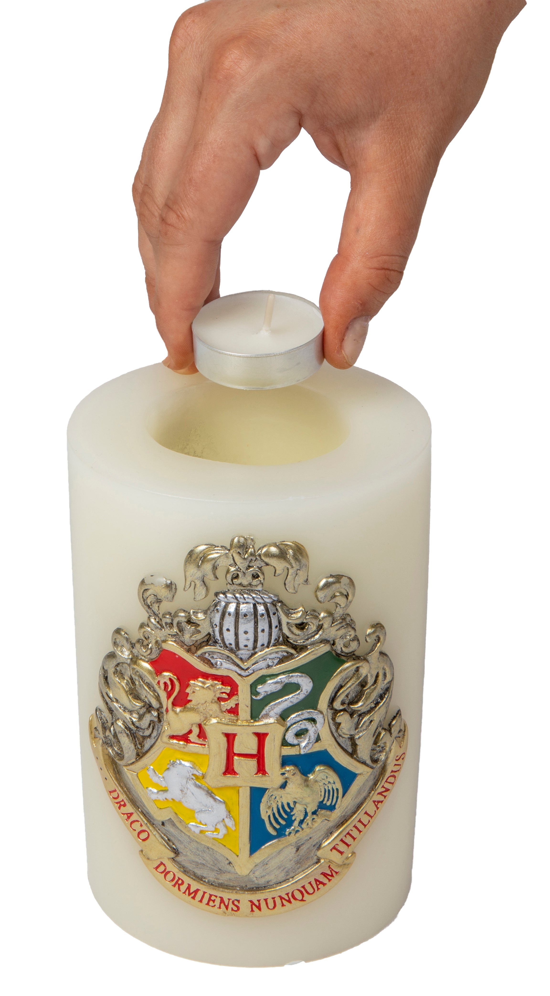 Hogwarts crest insignia candle from Harry Potter, featuring detailed sculpted design, ideal for home decor or fan collectibles.