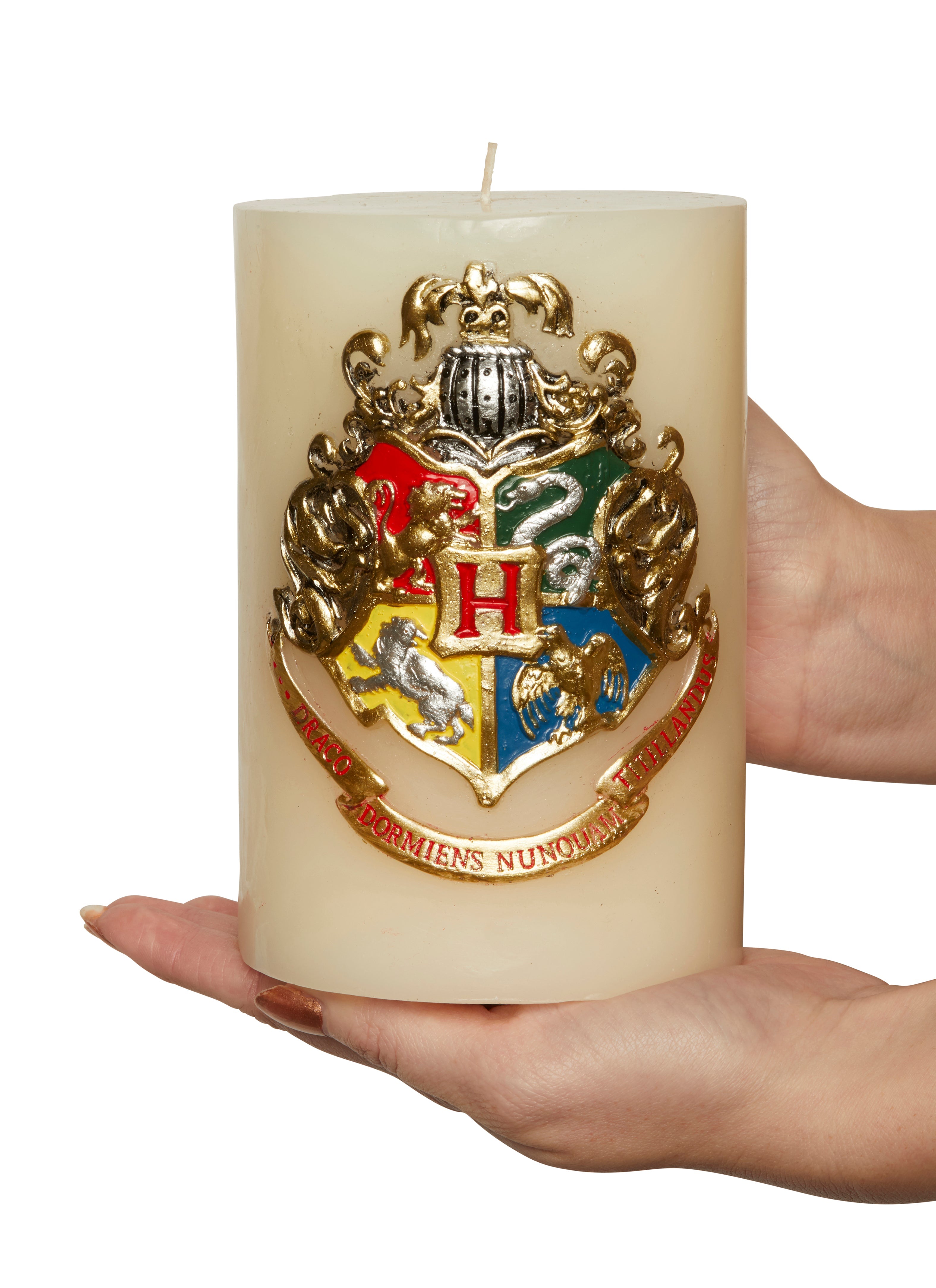 Harry Potter Hogwarts sculpted insignia candle, detailed home decor item featuring the Hogwarts crest in a crafted design.