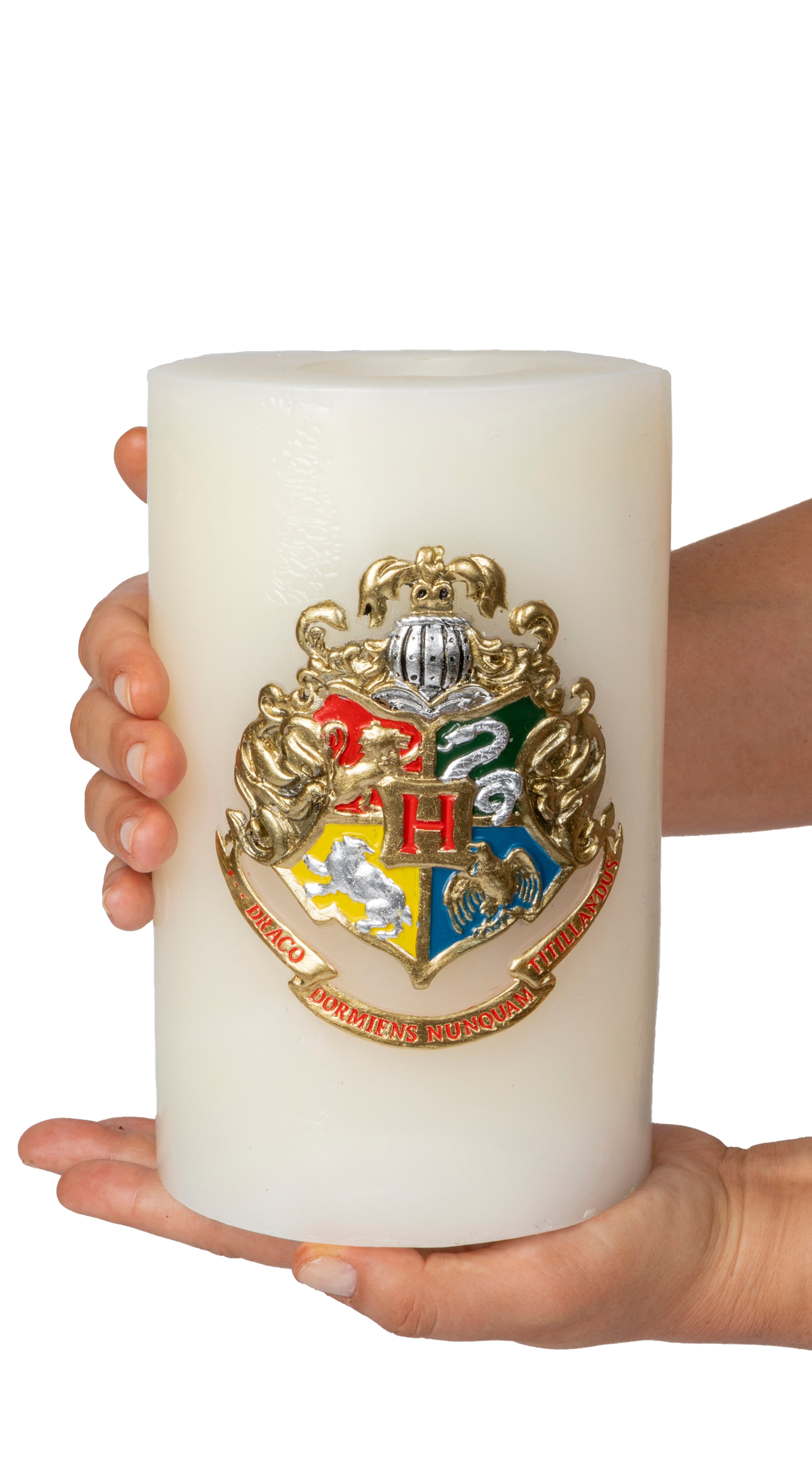 Large Harry Potter Hogwarts insignia candle from Insight Editions, featuring detailed sculpted design for home decor.