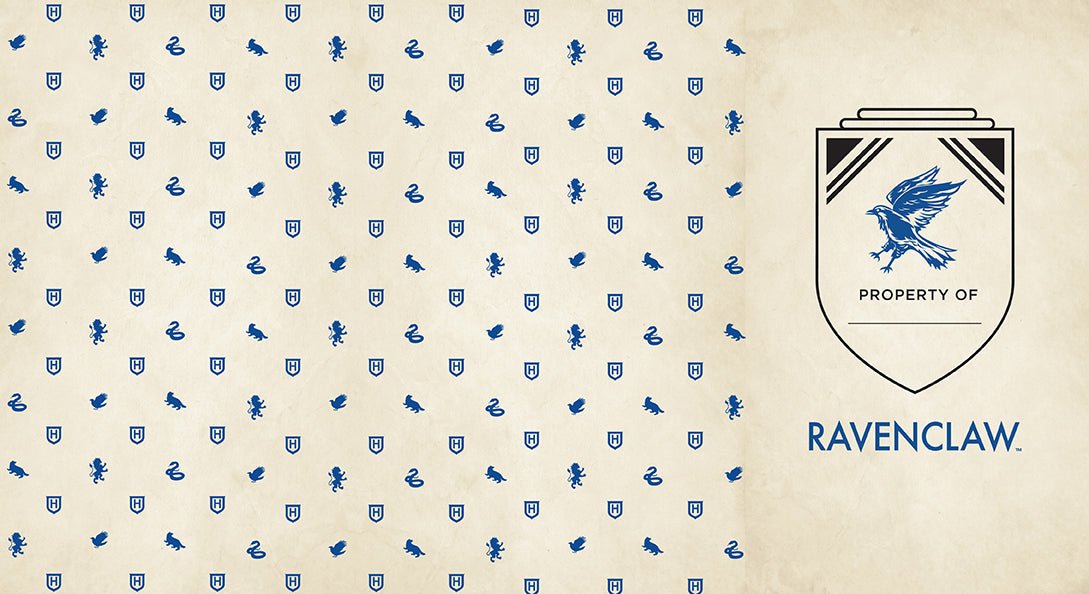 Inside view of the Harry Potter Ravenclaw hardcover ruled journal by Insight Editions, showing lined pages and Ravenclaw emblem.