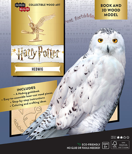 Softcover Harry Potter Hedwig book and 3D wood model by Insight Editions, featuring detailed Harry Potter-themed illustrations.