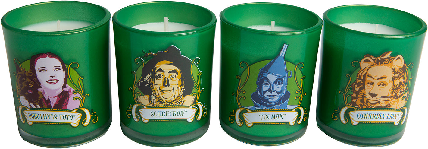 Set of four Wizard of Oz glass votive candles featuring colorful characters from the classic story, perfect for home decor.