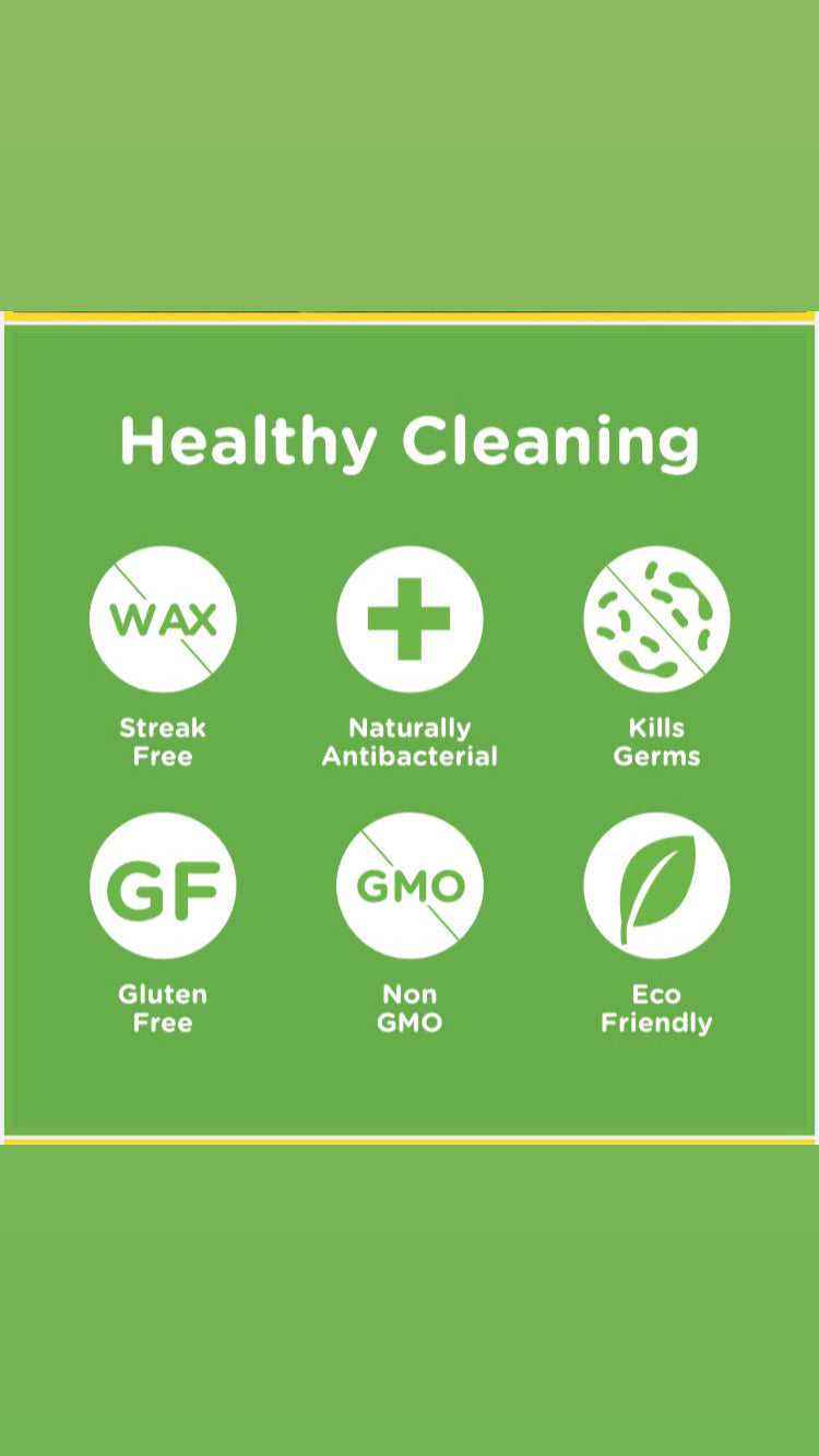 Natural non-toxic wood cleaner from Organic Chix, showing a spray bottle and clean wooden surface for healthy cleaning.