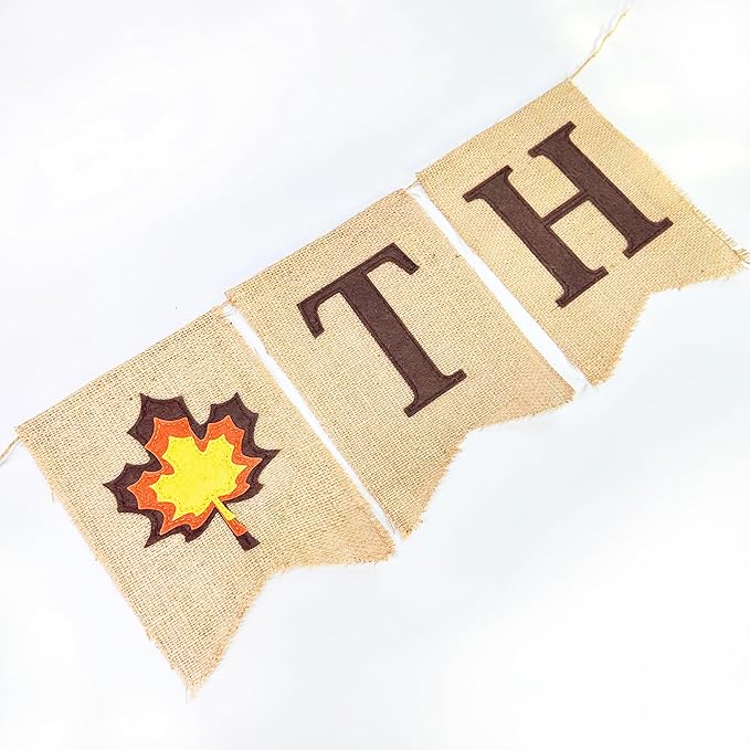 CozyNest Decor Thanksgiving burlap pennant banner with maple leaf pattern, fall colors, felt "Give Thanks" sign, and ribbon for autumn decor.
