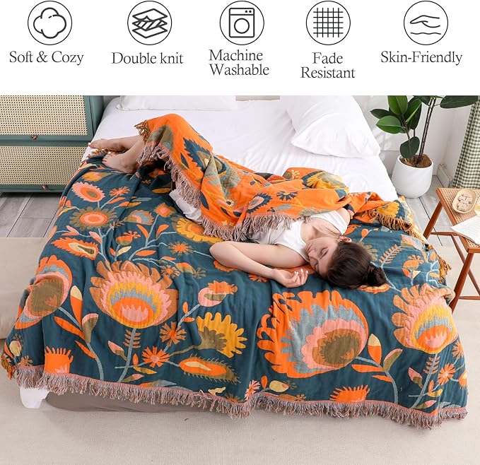 CozyNest Decor boho throw blanket in orange with floral farmstead design, 100% organic cotton muslin for bed or sofa decor.