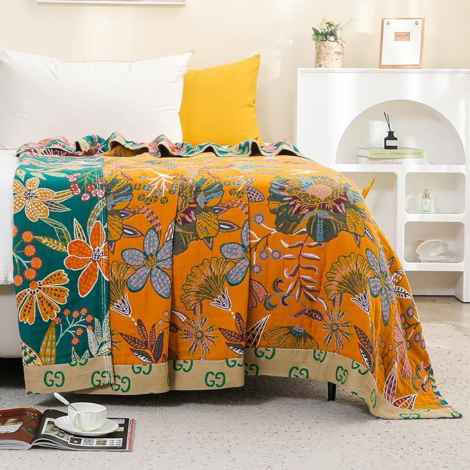 Reversible boho throw blanket by CozyNest Decor with floral design, lightweight cotton, perfect for bed or sofa, 60x80 inches.