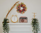 CozyNest Decor 22-inch fall chrysanthemum wreath with apples, pinecones, berries, eucalyptus, and maple leaves for seasonal decor.
