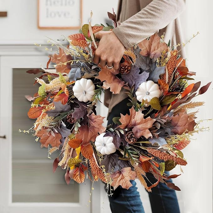CozyNest Decor 24-inch fall wreath with white pumpkins, grains, and maple leaves for front door autumn or Halloween decor.