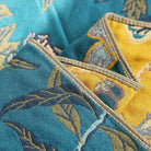 Boho muslin cotton blanket for adults with floral teal design, twin size 60x80 inches, soft and breathable for summer use.