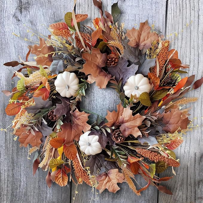 CozyNest Decor 24-inch fall wreath with white pumpkins, grains, and maple leaves for front door autumn and Halloween decor.