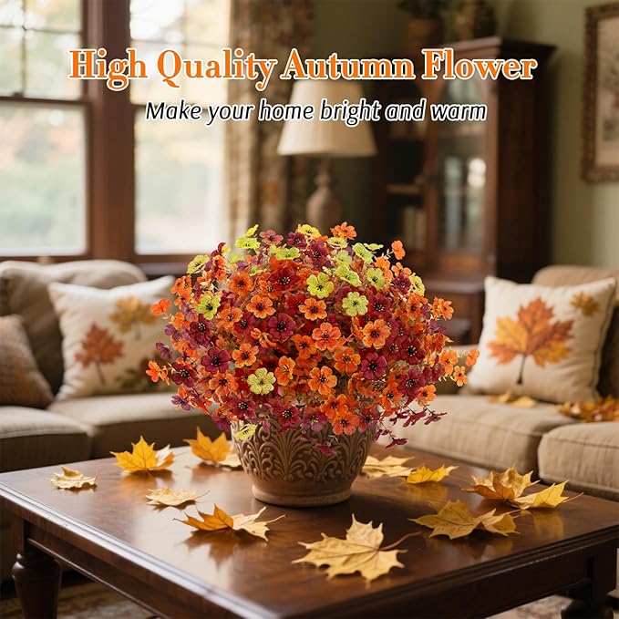 12 bundles of CozyNest Decor artificial fall flowers including faux mums in orange, brown, and yellow for outdoor or indoor decor.