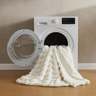 White faux fur throw blanket by CozyNest Decor, plush and cozy bed blanket, thick and warm for queen-sized bedding.