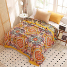 Soft boho muslin bed blanket for adults with geometric floral pattern, 80x90 inches, made of 100% cotton for cozy summer use.