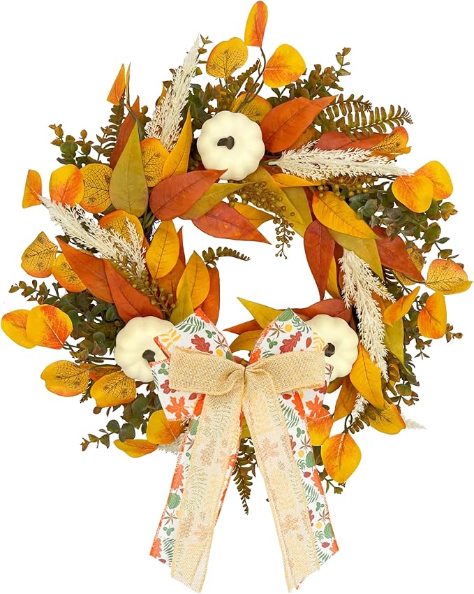 Rustic fall wreath with white pumpkins, golden eucalyptus, wheat, and a bow, perfect for front door autumn decor.
