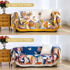 CozyNest Decor boho large throw blanket with fall floral, birds, and butterflies in organic cotton, perfect for sofa or bed decor.