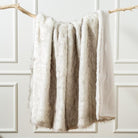 Luxury ivory white faux fur throw blanket by CozyNest Decor, extra large, soft, cozy, reversible to plush velvet for bed or couch.
