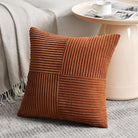 Rust-colored boho throw pillow covers with textured corduroy patchwork for couch or bed, 18x18 inches, CozyNest Decor.
