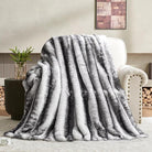 Black and white luxury faux fur blanket for bed, soft plush throw from CozyNest Decor, reversible, thick, decorative, 70x90 inches
