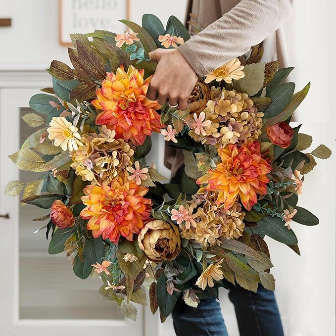 CozyNest Decor 24-inch fall wreath with orange hydrangea, peony, and dahlia flowers for front door autumn decor.
