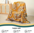 CozyNest Decor boho cotton throw blanket with yellow floral print, lightweight breathable woven bed throw, 80x90 inches.