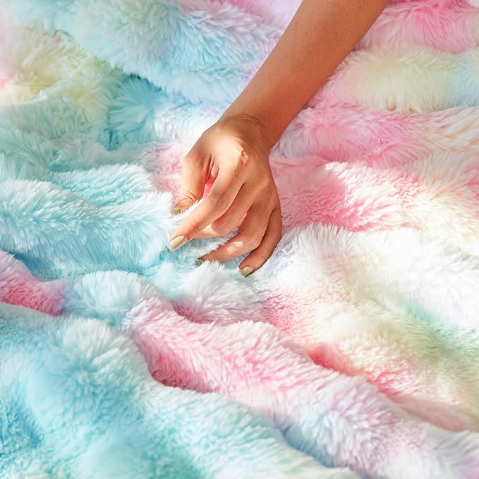 Colorful rainbow faux fur throw blanket by CozyNest Decor, plush fluffy tie dye design for sofa, chair, or bed decor.